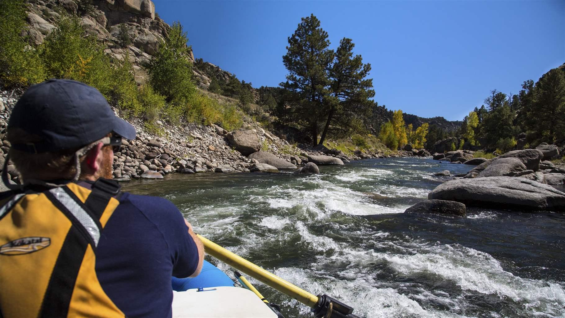 A rafter navigates rapids on the Arkansas River in Colorado’s Browns Canyon. 