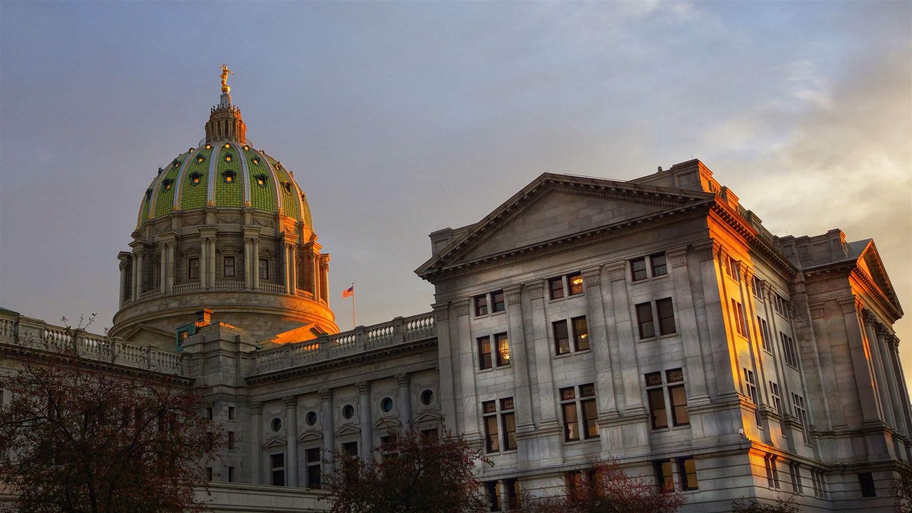 Exterior Of Pennsylvania State Capitol Against Sky During Sunset