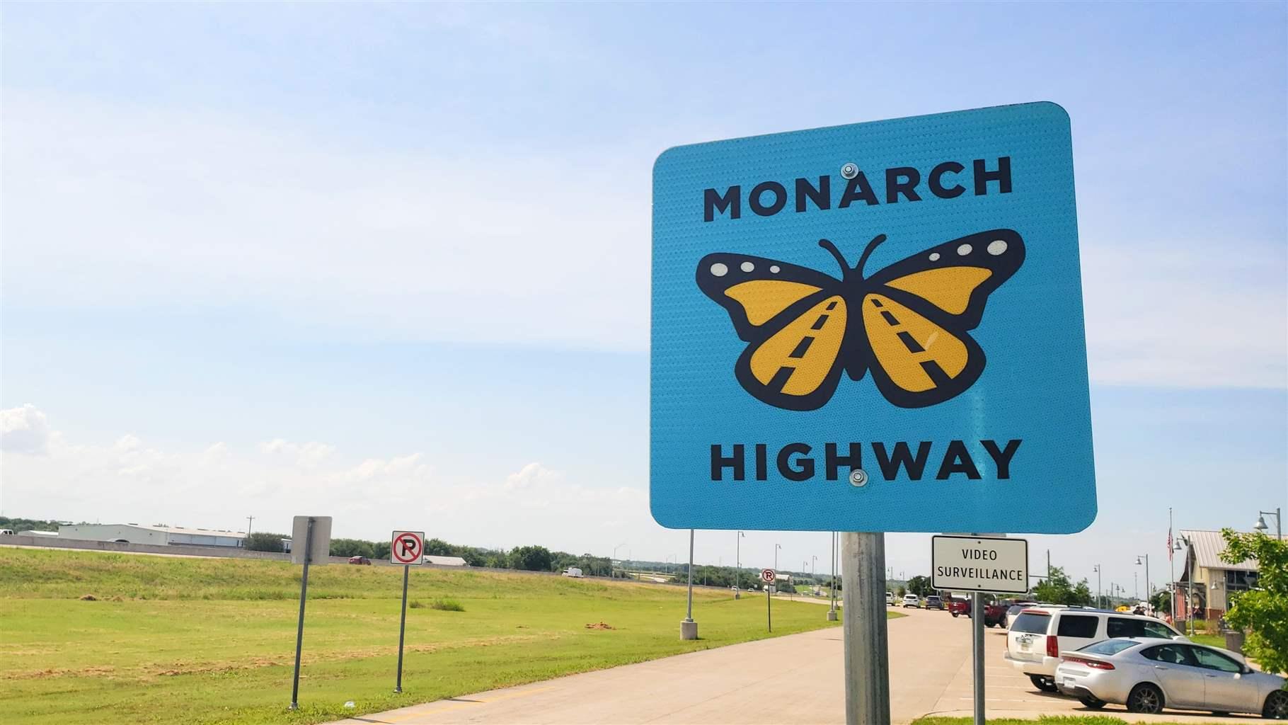 A road sign marks the Monarch Highway corridor near Abbott, Texas. Energy and transportation companies as well as some state and local governments across 23 states have voluntarily agreed to increase monarch habitat conservation.