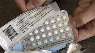 In this Aug. 26, 2016, file photo, a one-month dosage of hormonal birth control pills is displayed in Sacramento, Calif. 
