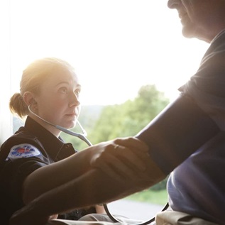 Paramedic with patient