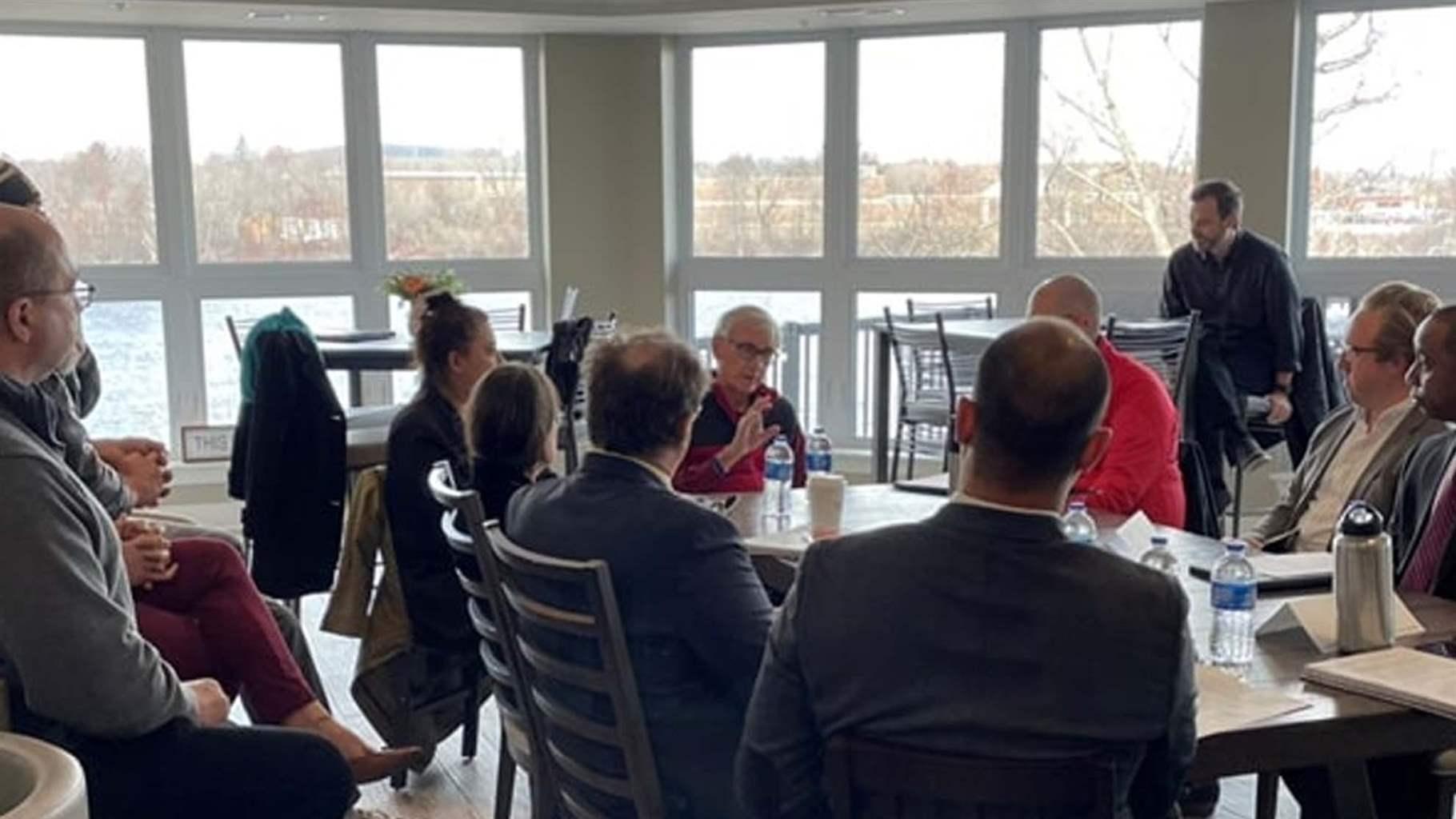 Wisconsin Governor Tony Evers (center) meets with elected officials and advocates in Wausau, Wisconsin, about his plan to create a chief resilience officer position to lead state resilience planning. Pew’s Zachary Bartscherer is among the attendees (second from right).