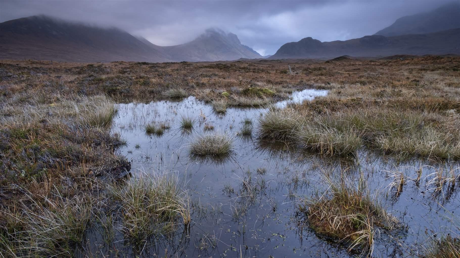 Peat Bogs and Moorland backed by the Cuillin Hills, near Sligachan, Isle of Skye, Inner Hebrides, Scotland, UK