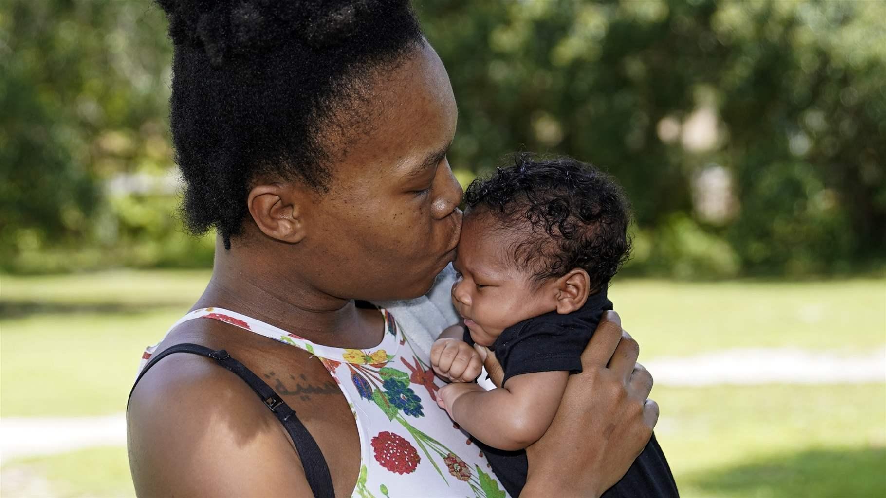 Venessa Aiken and infant son Venessa Aiken and infant son