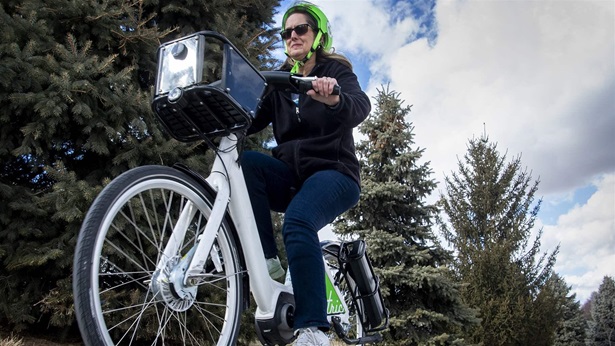 Pam Wisner of Valparaiso tries out one of five e-bikes available for a ride around Woods Park Pam Wisner of Valparaiso tries out one of five e-bikes available for a ride around Woods Park