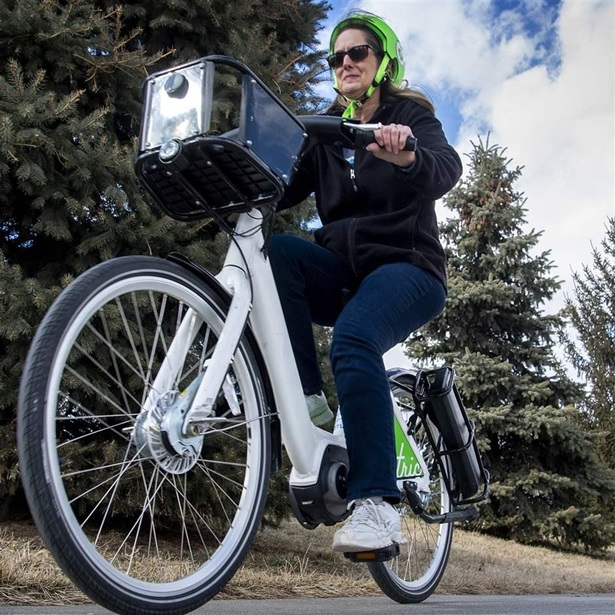 Pam Wisner of Valparaiso tries out one of five e-bikes available for a ride around Woods Park