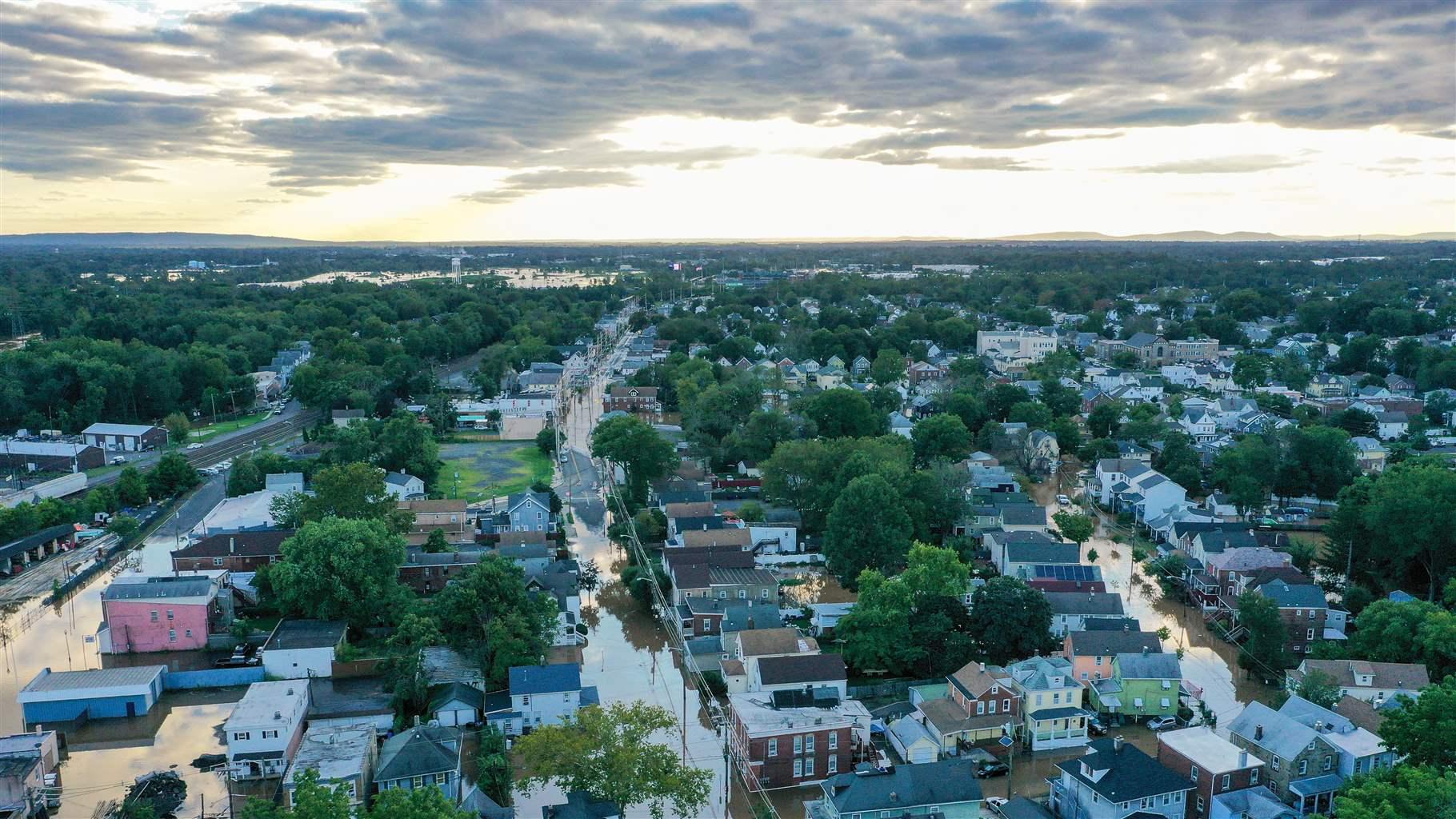 An aerial view of a community in Manville as flood water covers streets after Hurricane Ida left behind flash floods east coast, in New Jersey, United States on September 2, 2021.