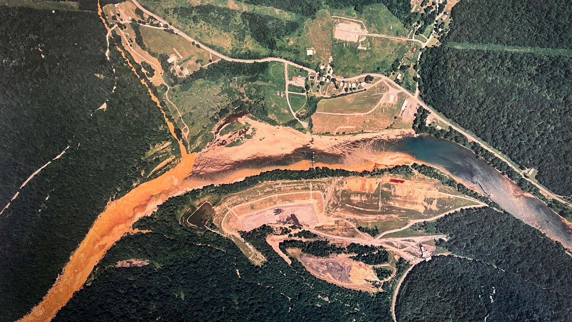 The Cheat River flows orange following a 1994 blowout of a coal mine just upstream from Cheat Canyon. 