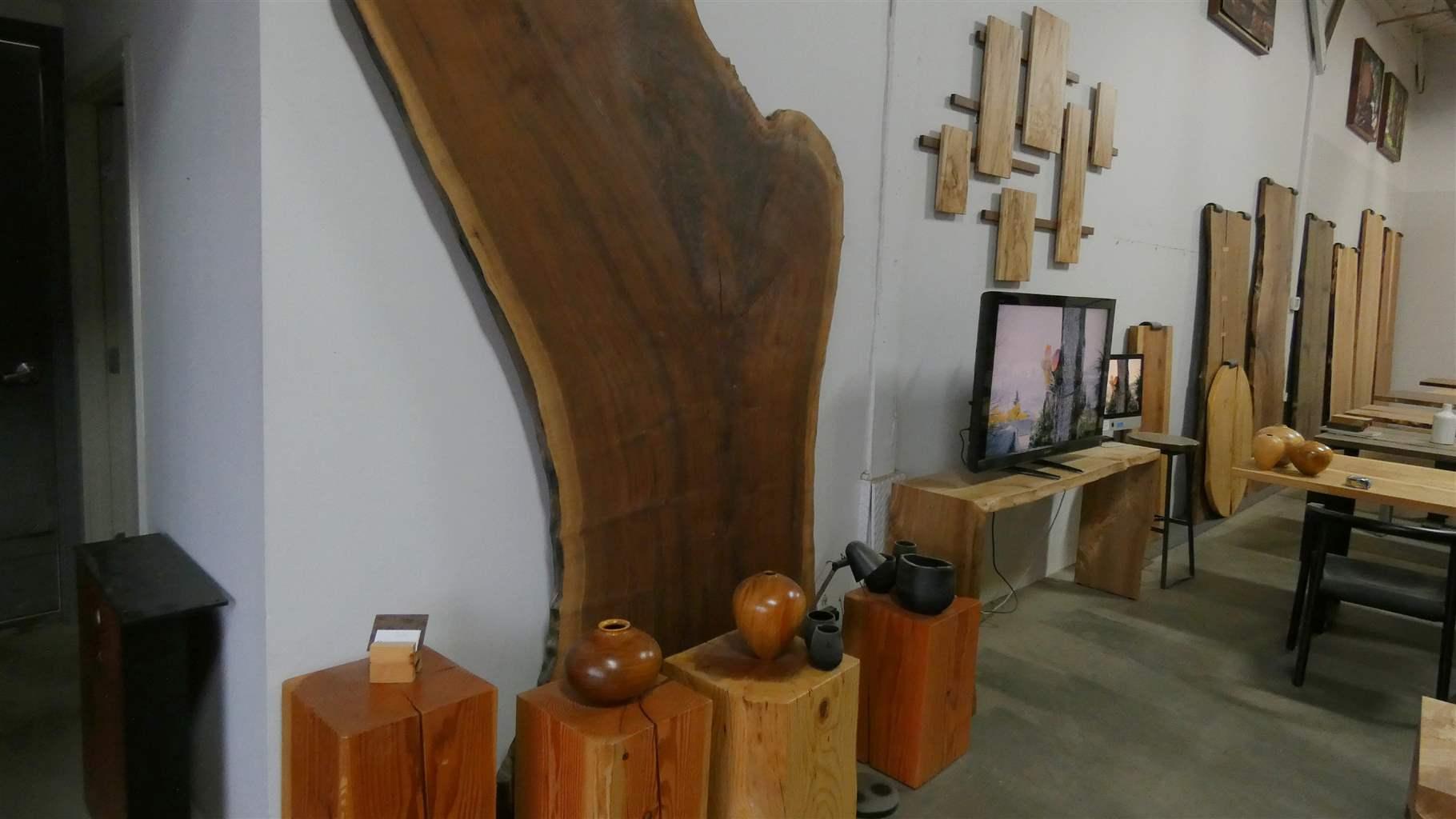 A variety of pieces are displayed in the showroom of Urban Hardwoods. 