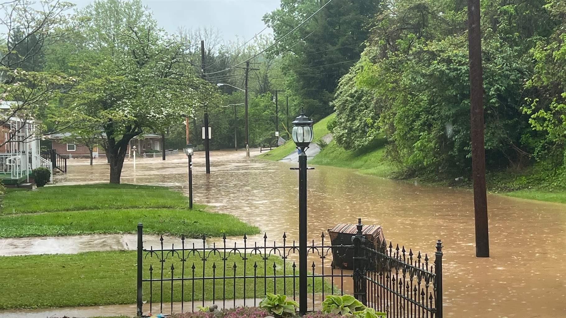 This May 6, 2022, flood in Enslow Park, a community in Huntington, West Virginia, made roads impassable and damaged vehicles and homes. Some residents had to be rescued from the rising water. 