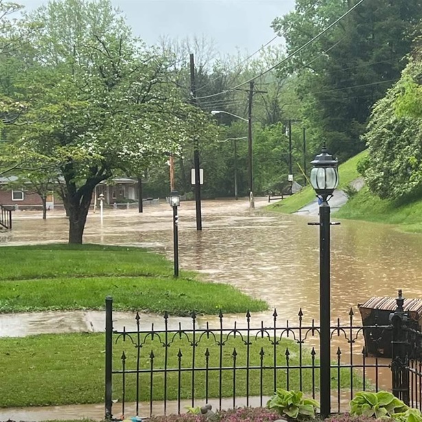 This May 6, 2022, flood in Enslow Park, a community in Huntington, West Virginia, made roads impassable and damaged vehicles and homes. Some residents had to be rescued from the rising water. 
