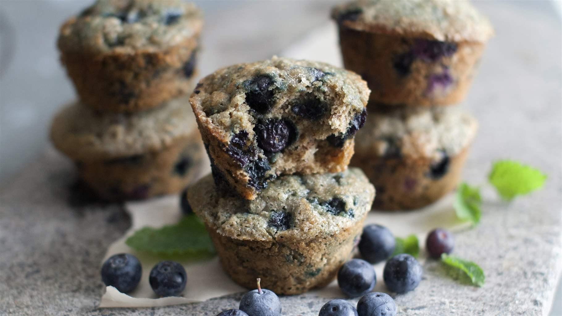 Food Healthy Muffins This June 30, 2014 photo shows hearty blueberry banana muffins in Concord, N.H. The whole-grain, fruit-packed muffins can begin a day with a healthy start