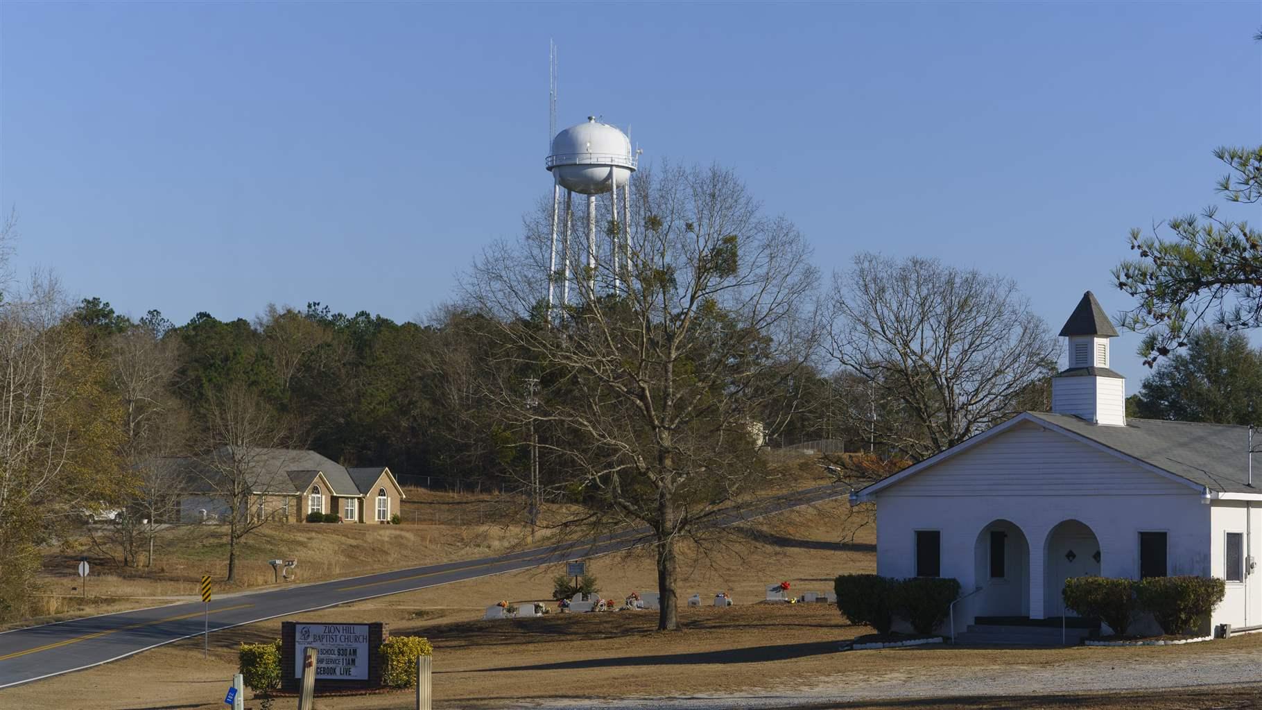 A water tower with antennas for broadband internet is seen on Monday, January 31, 2022 in Cusseta, GA. Chattahoochee County received millions in grant money to expand rural broadband access, but the result is internet that can only be accessed by residents with a line of sight to one of the two water towers in town.