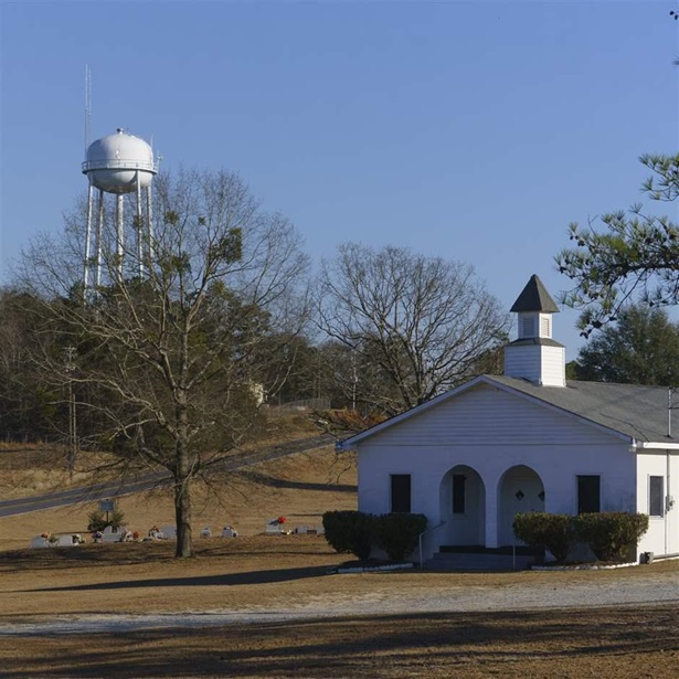 A water tower with antennas for broadband internet is seen on Monday, January 31, 2022 in Cusseta, GA. Chattahoochee County received millions in grant money to expand rural broadband access, but the result is internet that can only be accessed by residents with a line of sight to one of the two water towers in town.