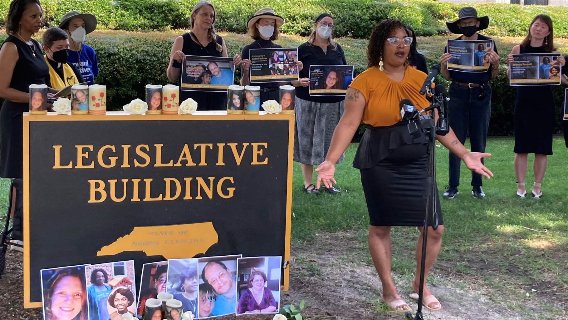 Courtney Crudup, 32, of Oxford, N.C., speaks outside the North Carolina Legislative Building in Raleigh at a July news conference and vigil urging lawmakers to expand Medicaid. North Carolina appears likely to become the 40th state to expand the program.