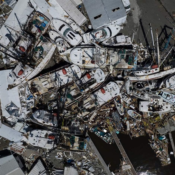 United Nations Must Finalize High Seas Treaty in 2023 An aerial picture taken on September 29, 2022 shows piled up boats in the aftermath of Hurricane Ian in Fort Myers, Florida. - Hurricane Ian left much of coastal southwest Florida in darkness early on Thursday, bringing "catastrophic" flooding that left officials readying a huge emergency response to a storm of rare intensity.