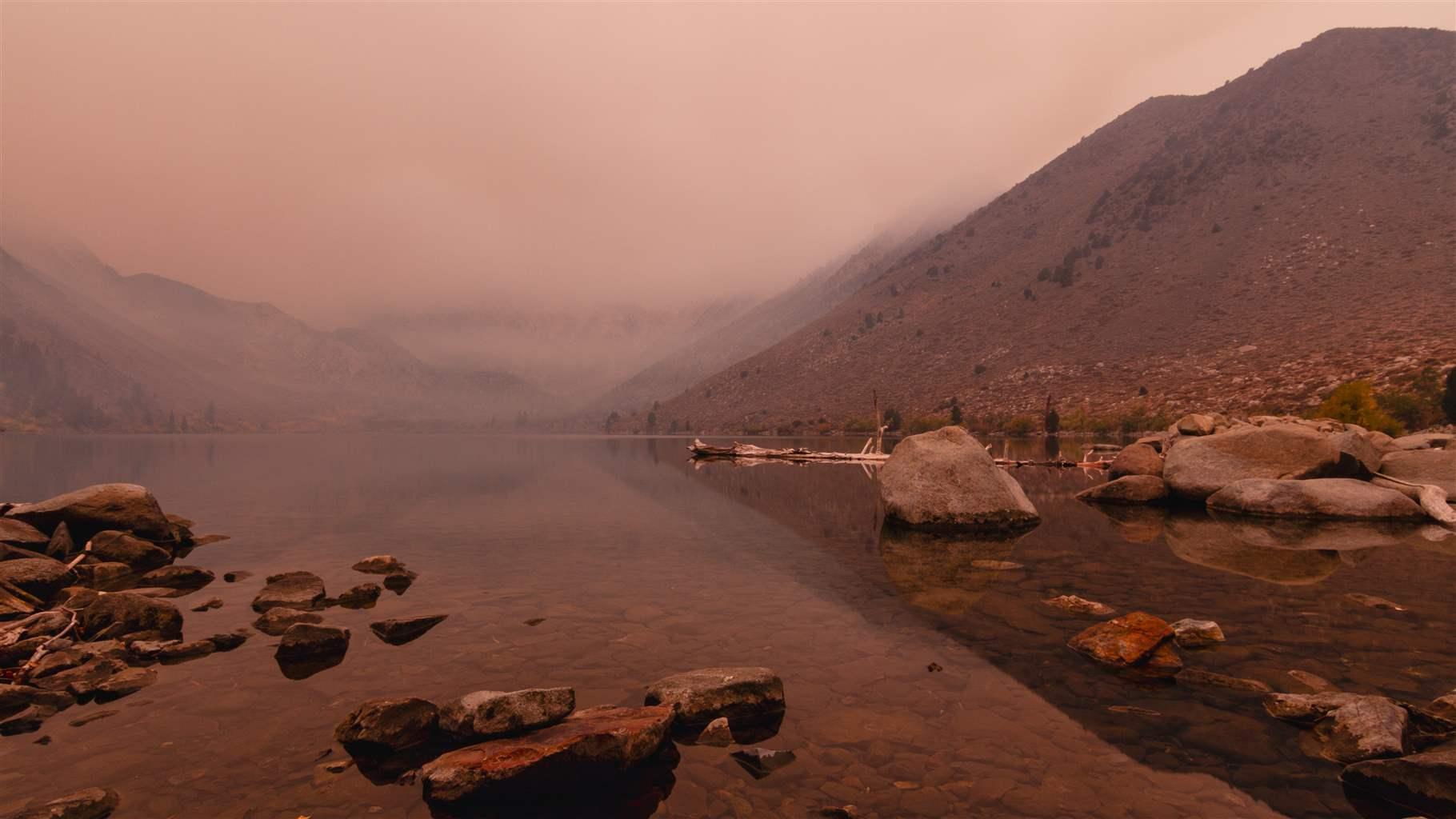 Sunrise At Convict Lake Through Smoke From The Creek Fire.