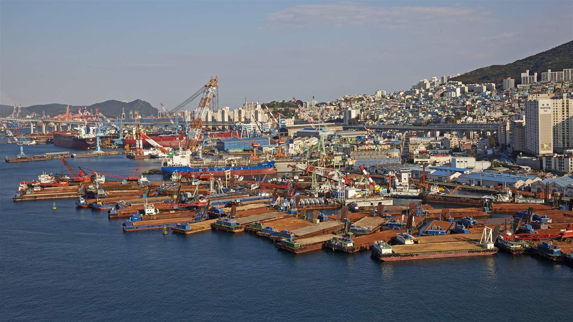 Elevated cityscape of industrial harbour in Busan 