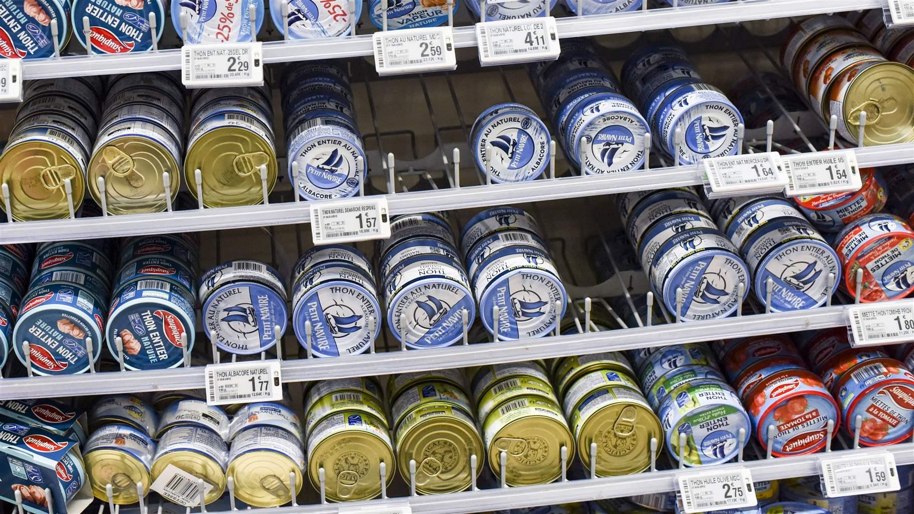 Cans of tuna are seen in a section of a supermarket of Nantes, western France