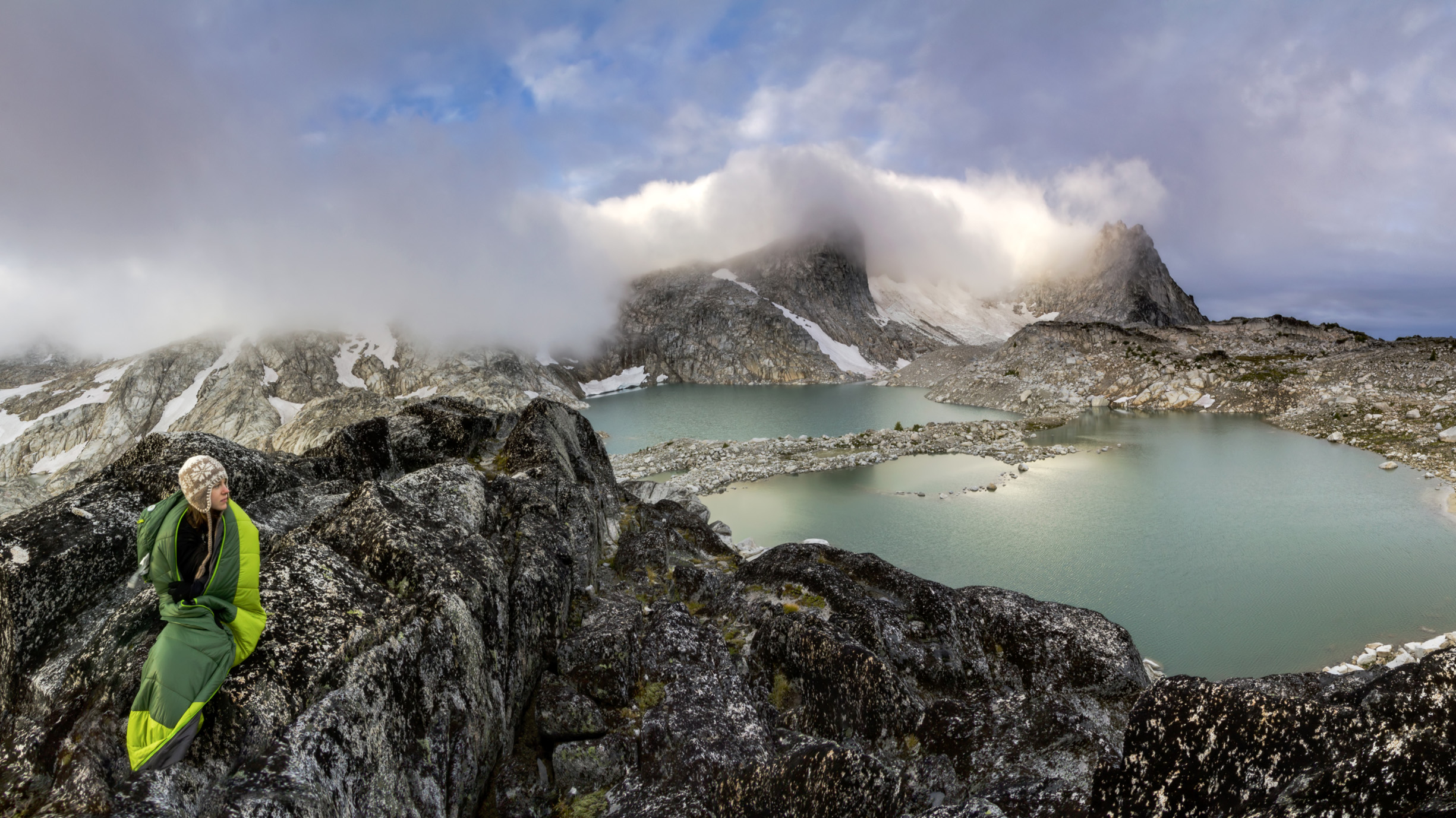 Backpacker at Sunrise, Isolation Lake, Alpine Lake Wilderness, Washington.